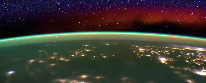 Airglow (red and green) in the ionosphere illuminates Earth’s horizon in this image taken from the International Space Station.